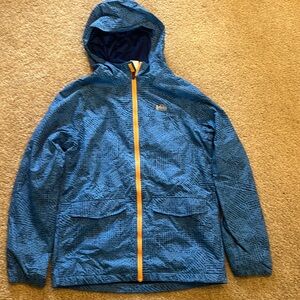 Blue REI rain coat, like new.
